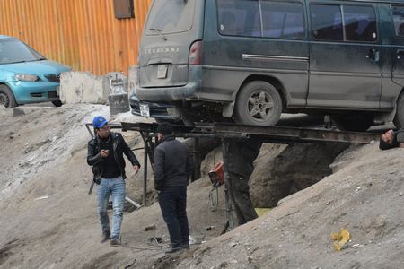 Далан сэтэлсэн авто засварын үйл ажиллагааг зогсоолоо