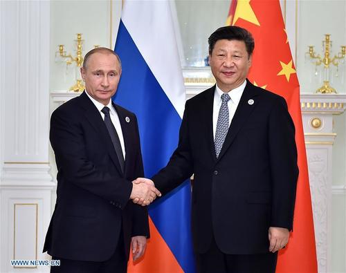 Путины хүндэт зочин Си Зиньпин